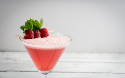 raspberry cosmopolitan martini vodka cocktail drink bar mint garnish ice bartender